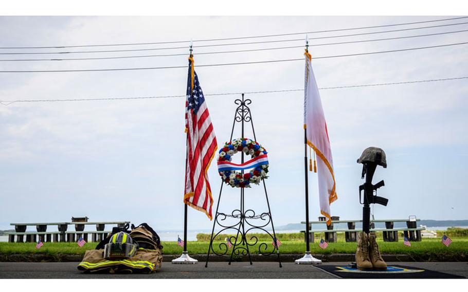 A wreath is displayed in honor of the lives lost on 9/11 at Misawa Air Base, Japan, Sept. 11, 2020. Airmen and families from across the base, including young children attended the ceremony and memorial climb in efforts to not only educate but also to ensure we never forget the sacrifices made that day. (U.S. Air Force photo by Airman 1st Class China M. Shock)