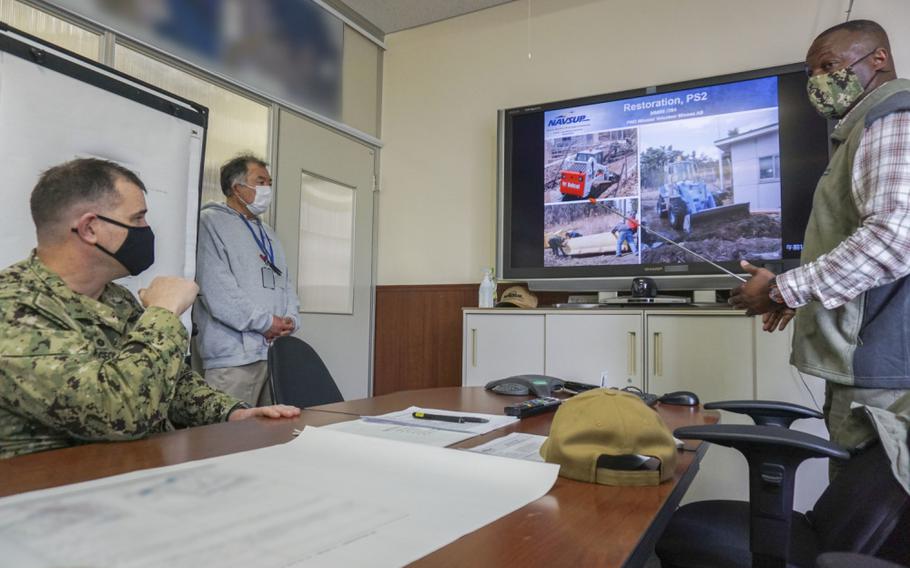 HACHINOHE, Japan (March 12, 2021) - NAVSUP Fleet Logistics Center Yokosuka Commanding Officer Capt. Edward Pidgeon (left) is briefed on Defense Fuel Service Point Hachinohe's operations after the facility was damaged by a tsunami 10 years earlier.