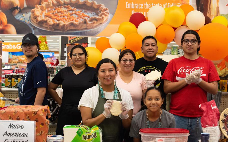 Volunteers from the Yokota community make frybread, a Native American dish, for commissary shoppers to sample at Yokota Air Base, Japan, Nov. 15, 2024.