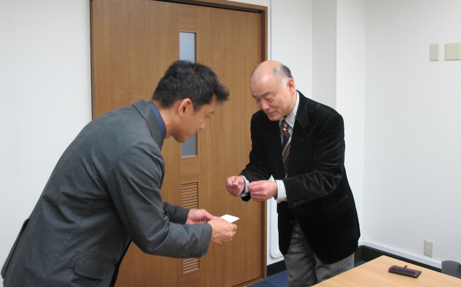 exchanging business cards