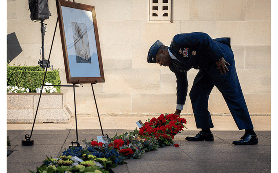 Col. Otis C. Jones, 374th Airlift Wing commander, pays respects during a Last Post Ceremony, Nov. 21, 2019, at Canberra, Australia. During the ceremony, visitors are invited to lay wreaths and floral tributes for a fallen soldier. (U.S. Air Force photo by Senior Airman Juan Torres)