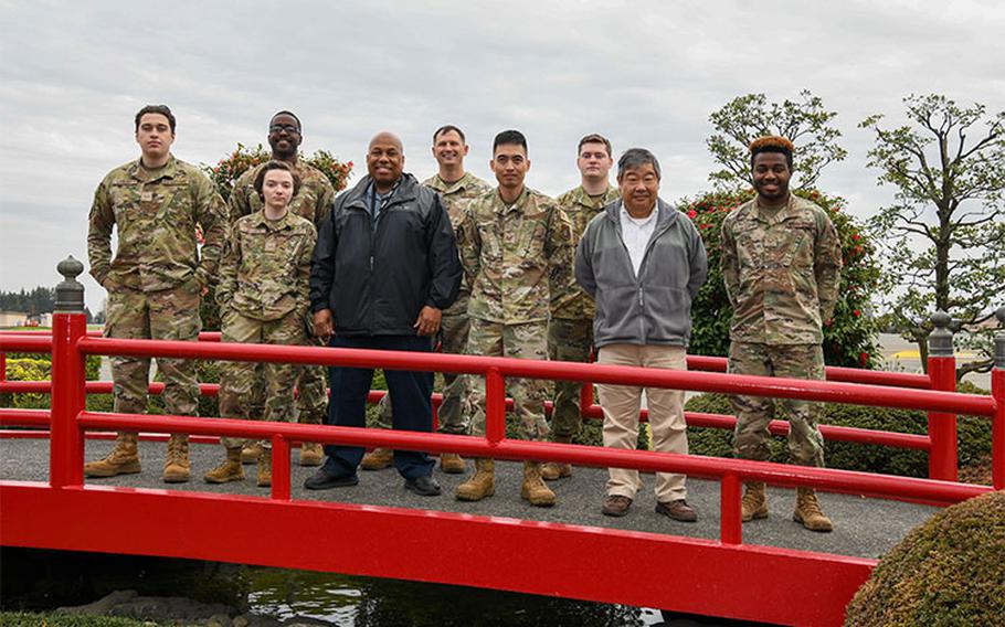 The 374th Operation Support Squadron airfield management flight poses for a photo at Yokota Air Base, March 27th, 2023. The 374th OSS Airmen’s creation of the first Landing Zone Safety Officer course to be certified by the Air Force Special Operations Command is one of many reasons they earned the 2022 Ronald B. McCarthy Airfield Management Facility of the Year. (U.S. Air Force photo by Senior Airman Spencer Tobler)