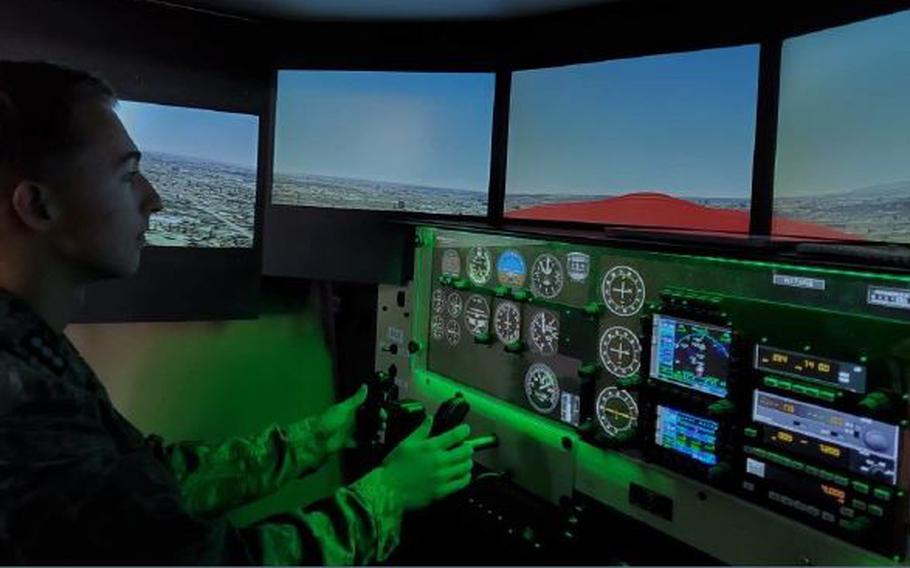 Cadet Captain Redmond performs pattern work in the simulator demonstrating an understanding of aircraft controls.