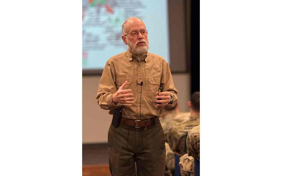 Jorge Romero, 421st Combat Training Squadron Southern Command subject matter expert, gives a lecture during the Air Advisor A course at Yokota Air Base, Japan, Sept. 26, 2024.