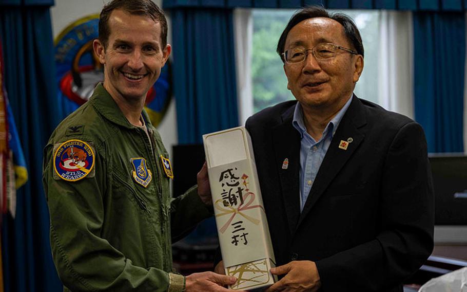 U.S. Air Force Col. Michael Richard, 35th Fighter Wing (FW) commander, and Mr. Shingo Mimura, Governor of Aomori Prefecture and 35th FW honorary commander, pose for a photo during Mr. Mimura’s visit at Misawa Air Base, Japan, June 23, 2023. Mr. Shingo Mimura has been the governor of Aomori for over 20 years and is the honorary 35th Fighter Wing commander. (U.S. Air Force photo by Senior Airman Antwain Hanks)