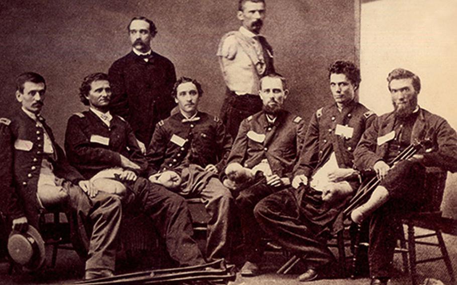 Group of Civil War era Army officers who have undergone amputations due to gunshot injuries pose for a photo. Circa 1865. (Photo from the NMHM Communications Office.)