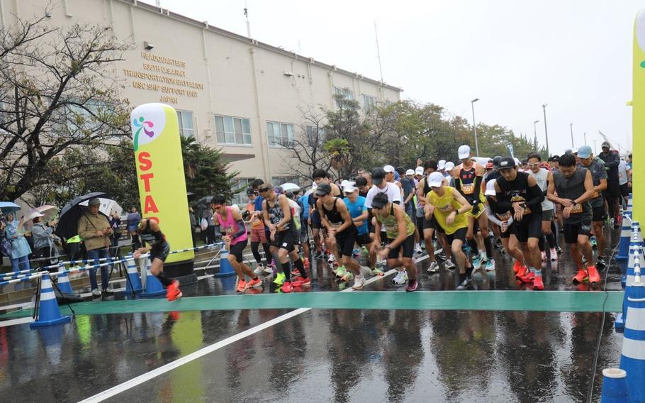 Runners take off at the start of the Yokohama North Dock Running Festival, held Nov. 3 on the installation.