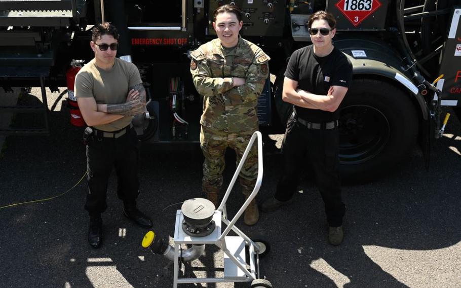 Members of the 374th Logistics Readiness Squadron pose for a photo with the new moosehead prototype at Yokota Air Base, Japan, May 3, 2024. 