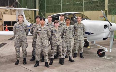 Photo Of Misawa Cadet Squadron cadets stand in front of a DA-40 plane they flew prior that day!