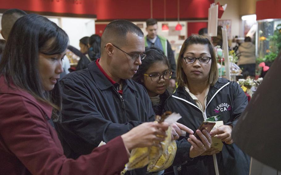 U.S. Navy Sailors and families with Aviation Intermediate Maintenance Detachment (AIMD) Iwakuni tour the Kasinoki Cake Factory in Yanai, Japan, Jan. 20, 2019. AIMD visited the factory during a day trip to a series of different locations as a way to increase morale and unit cohesion. (U.S. Marine Corps photo by Cpl. Andrew Jones)