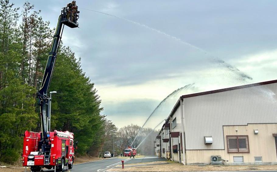 Firefighters from U.S. Army Garrison Japan and the Higashi-Hiroshima Fire Department participate in a joint training exercise at Kawakami Ammunition Depot, Japan, March 18, 2024.