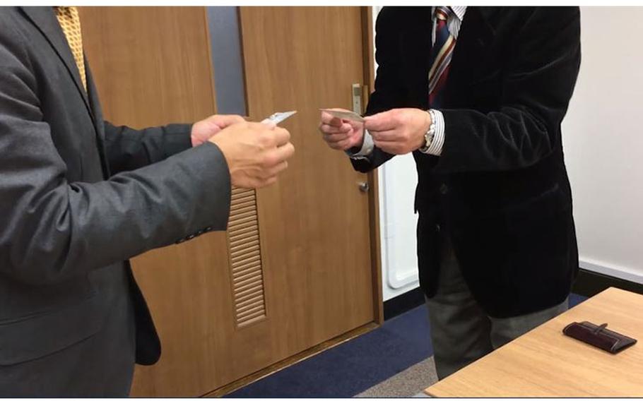 exchanging business cards