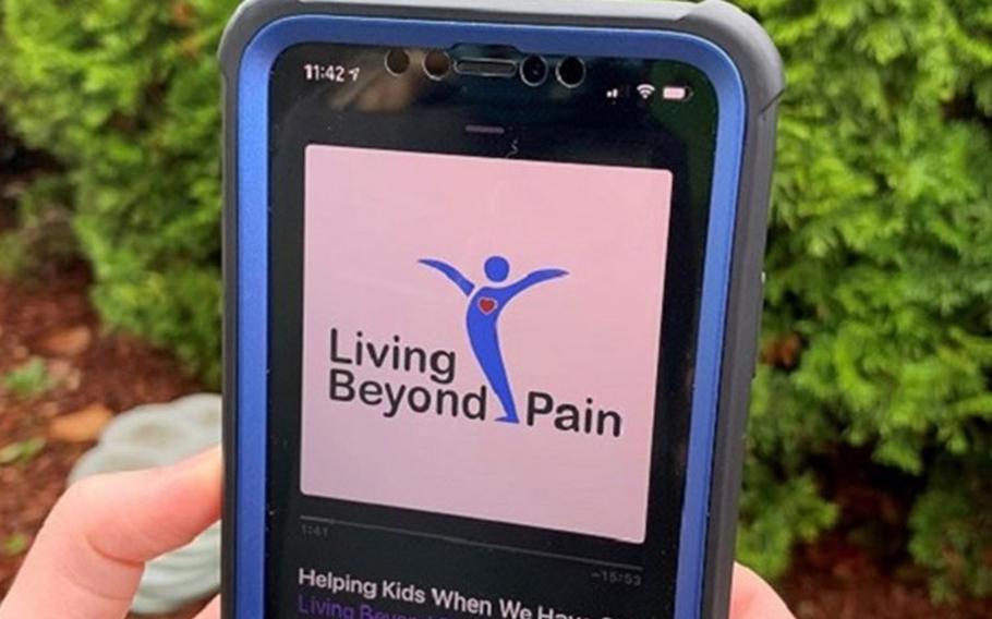 A Military Health System beneficiary listens to the Living Beyond Pain podcast. (Photo by William Wheeler, Connected Health Branch.)