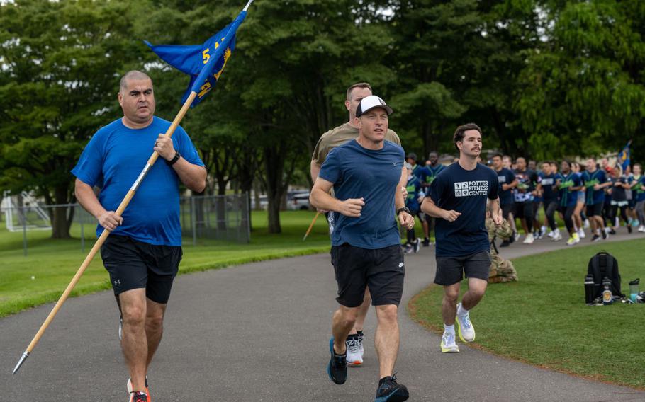 Leadership from the 35th Fighter Wing inaugurate Wing Sports Day with a two-lap run at Misawa Air Base, Japan, Aug. 23, 2024.