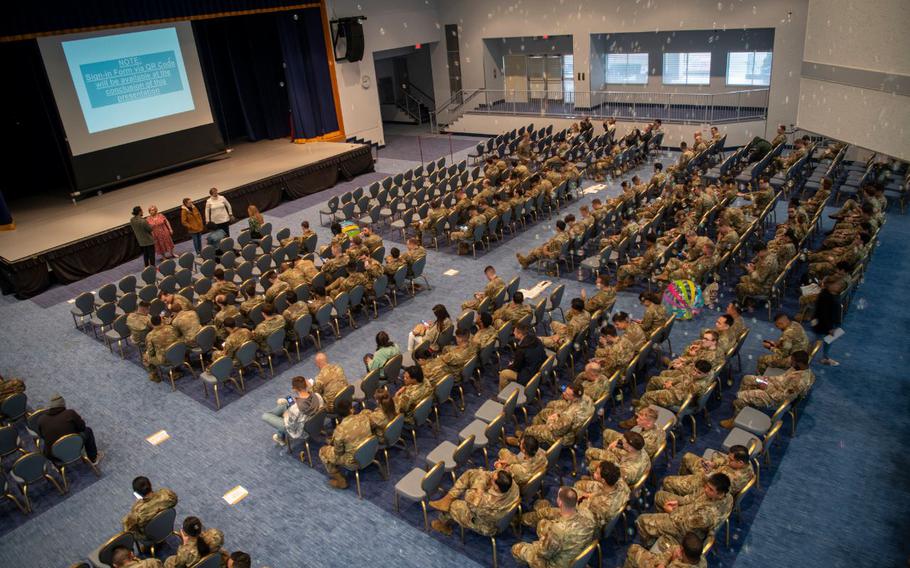 U.S. Air Force Airmen assemble at the Taiyo Community Center for a resiliency day all call at Yokota Air Base, Japan, April 23, 2024. During the all call, Airmen were informed on how to identify sexual harassment and employ strategies to navigate and stop it when seen in real-world situations.