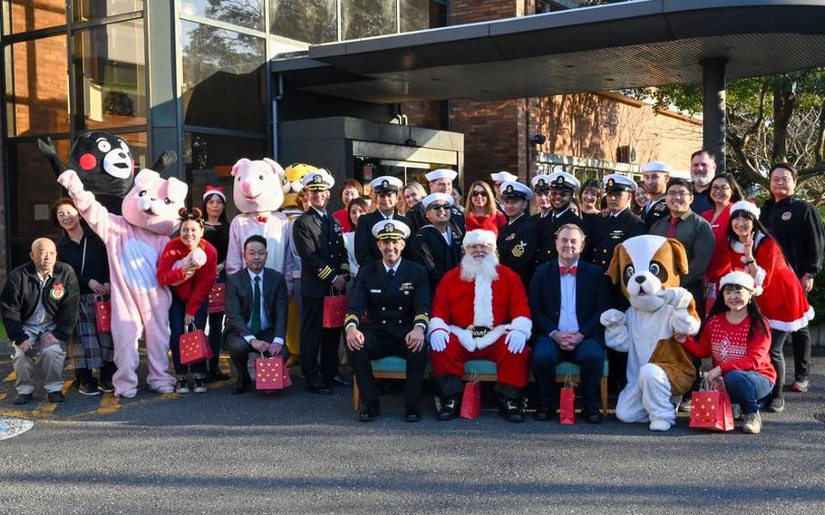 Volunteers from U.S. Naval Ship Repair Facility and Japan Regional Maintenance Center (SRF-JRMC) deliver the holiday spirit during the annual Christmas party at Miura Shiratori-en, Dec. 5, 2024.