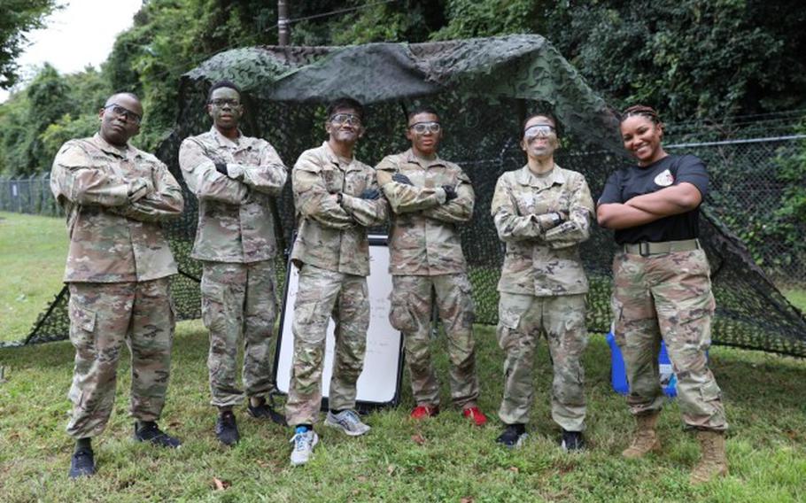 From left, 35th Combat Sustainment Support Battalion Command Sgt. Maj. Paul Denson; “Best Warrior” competitors Spc. Demarr Richmond, Staff Sgt. Miguel Yap, Pfc. Matthew Hicks, Sgt. Nhien Nguyen; and competition coordinator Staff Sgt. Saony Lopez pose for a photo before the medical/first aid event held as part of the second annual competition Oct. 13 on Camp Zama, Japan. (Noriko Kudo)