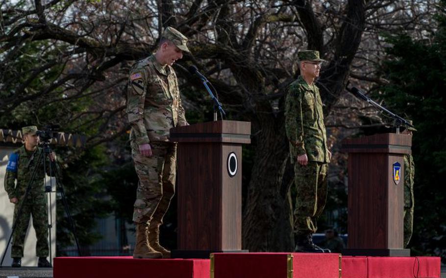 U.S. Army Lt. Gen. Gary J. Volesky, I Corps commanding general, and Japan Ground Self-Defense Force Lt. Gen. Takayuki Onozuka, commanding general of the JGSDF Eastern Army, address Yama Sakura 77 participants during the closing ceremony at Camp Asaka, Japan, Dec. 15, 2019. (Photo Credit: Spc. John Weaver)