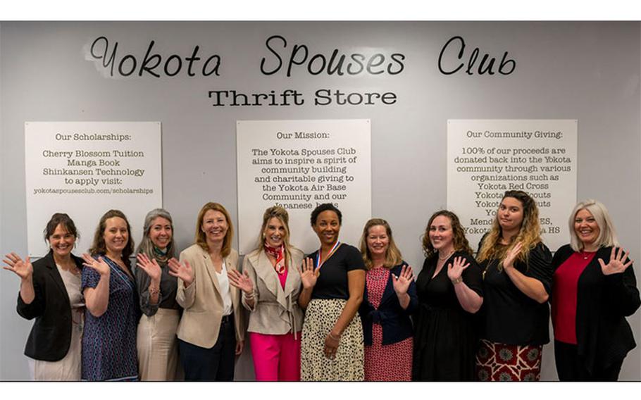 Cindy Wilsbach (center-left), First Lady of Pacific Air Forces, poses for a photo with the Yokota Spouses Club at the base thrift store during a site visit at Yokota Air Base, Japan, April 18, 2023. Wilsbach visited the group to provide a volunteer award medal to Yokota Spouse’s Club President, Amber McClenny, for her extensive efforts in support of community events at the base. (U.S. Air Force photo by Staff Sgt. Ryan Lackey)