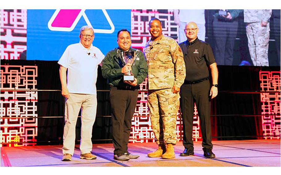 (left to right) Exchange Director/CEO Tom Shull; Yokota AB Exchange General Manager Andrew Defelice; Exchange Senior Enlisted Advisor Chief Master Sgt. Kevin Osby; and Exchange Chief Operating Officer Jason Rosenberg.