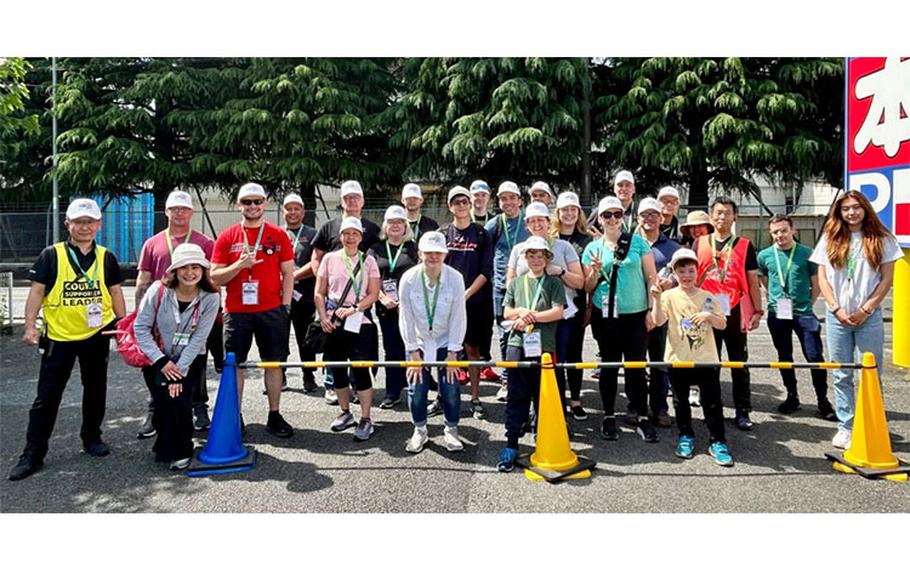 Nearly 20 volunteers from Camp Zama, Japan, helped Saturday during Tour of Japan, the largest international bicycle race in Japan. Sagamihara was the site of the seventh and penultimate stage of the race, which concluded in Tokyo. (Tim Flack, U.S. Army Garrison Japan Public Affairs)