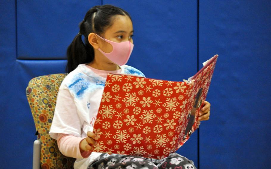 Leila Kaea, 9, narrates the holiday play at the School Age Center at Sagamihara Family Housing Area, Japan, Dec. 18.