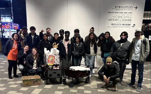 Photo Of Members of Camp Zama’s Keystone Club prepare to provide hot food, snacks and other items to homeless people in Yokohama during a volunteer outreach event Jan. 11.