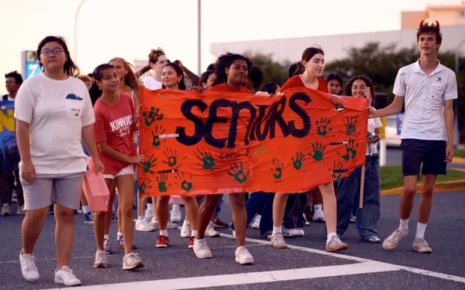 The Nile C. Kinnick High School senior class marches in school’s homecoming parade September 13, 2024.