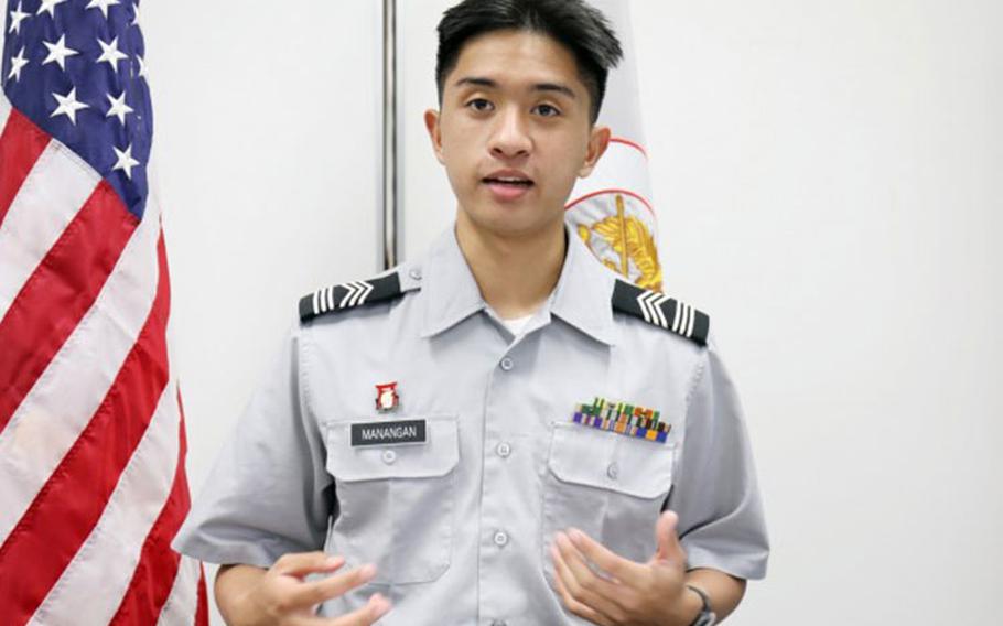 Cadet Master Sgt. Michael Manangan, a senior at Zama Middle High School and a member of the school’s U.S. Army Junior Reserve Officers’ Training Corps program, reads his essay on “The Challenges of Online and In-Person Learning in a Pandemic Environment” at the school, Camp Zama, Japan, Feb. 23. His essay came in third out of 106 annual JROTC essay contest entries from the 8th Brigade, U.S. Army Cadet Command, headquartered at Joint Base Lewis-McChord in Washington.