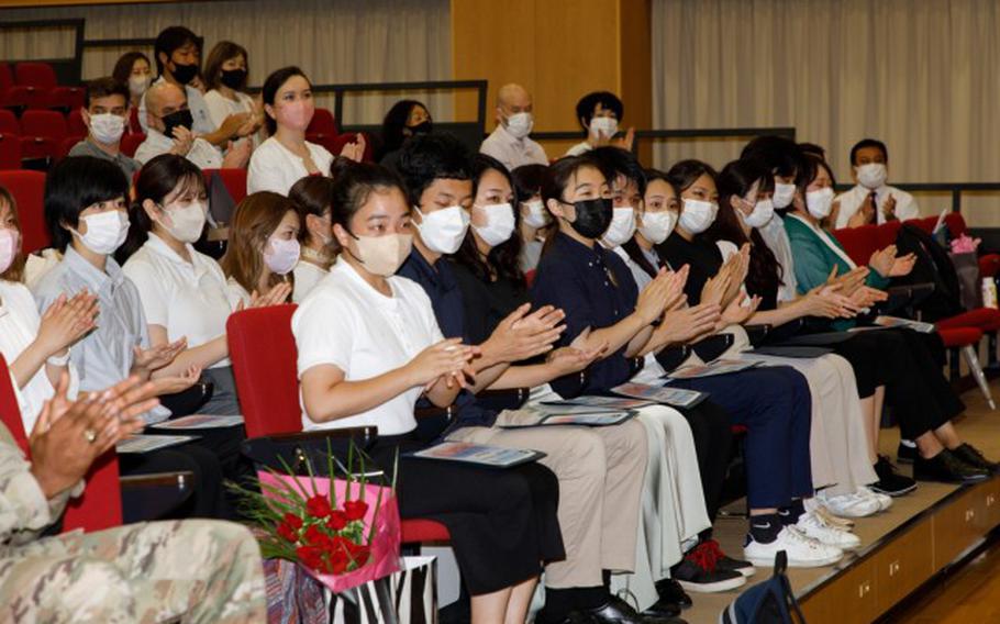 Japanese university students attend a graduation ceremony for the summer internship program at Camp Zama, Japan, Sept. 1, 2022. This year's program had the largest participation in its nine-year history with 23 students, 11 universities and 19 workplaces participating. (Kei Sasaki)