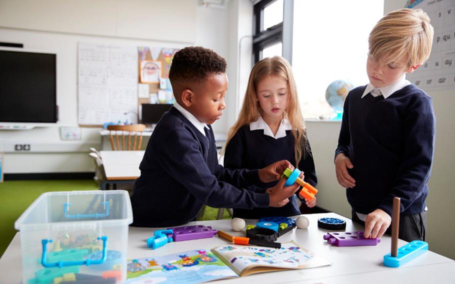 Kids playing with toys in school