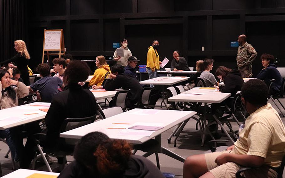 Yokota High School Students set up for the Armed Services Vocational Aptitude Battery (ASVAB) test at Yokota Air Base, Japan, November 2022. Over 140 students from 10th to 12th grade took the exam as part of the ASVAB Career Exploration Program (CEP), a resource that helps teens determine their skills and interests and find careers that align with them. (Courtesy photo)