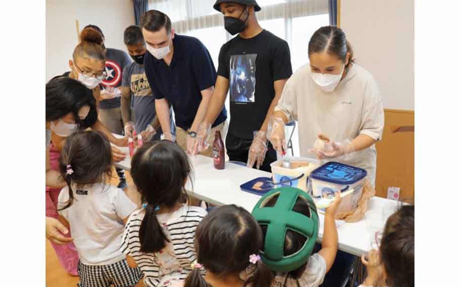 Soldiers from the 38th Air Defense Artillery Brigade serve ice cream to Sagamihara Minami Children’s Home residents during an exchange event in Sagamihara, Japan, Aug. 14, 2024. The outreach event allowed the Soldiers to help the residents beat the summer heat while providing them an opportunity to interact with each other.