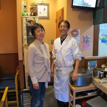 Mr. and Mrs. Yamazaki pose for a photo.