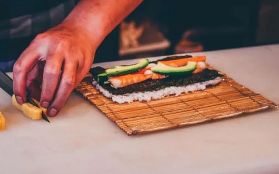 making a sushi roll