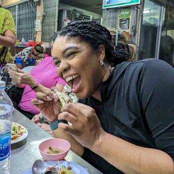 Chrissy eating street food