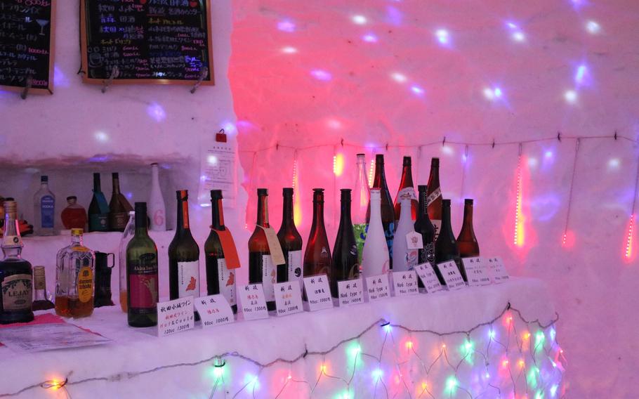 sake bottles at bar