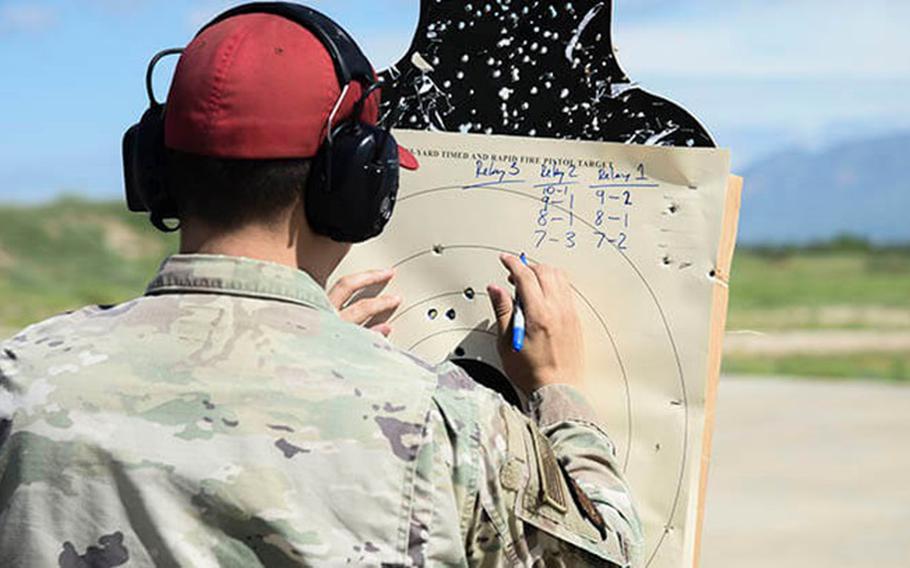 An Air Force Airman inspects a target used during a shooting competition at Davis-Monthan Air Base, Arizona, in 2021. The True North program is a resilience program that embeds providers and spiritual leaders within squadrons and groups. Davis-Monthan implemented True North in October 2020. (Photo: Air Force Airman 1st Cl. William Turnbull)