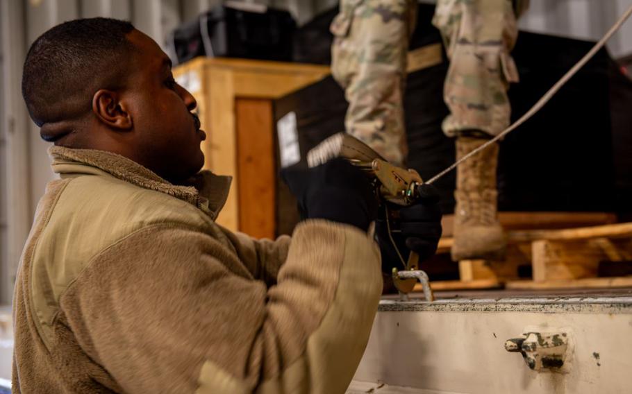 U.S. Air Force Airman 1st Class Andrew Davis 35th Logistic Readiness Squadron (LRS) ground transport operator, tightens a ratchet strap to secure cargo for the Rhino Express program at Misawa Air Base, Japan, April 15, 2025. Securing cargo is essential to the 35th LRS Rhino Express program and the 35th Fighter Wing as it ensures safe transport, prevents damage to critical equipment, and supports mission readiness by enabling rapid and efficient deployments under agile combat employment concepts. 