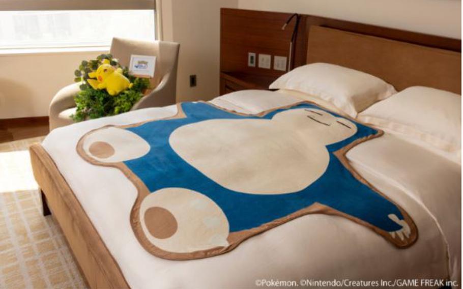 A Snorlax blanket to snuggle at the Pokémon Sleep Stay (not to take home)