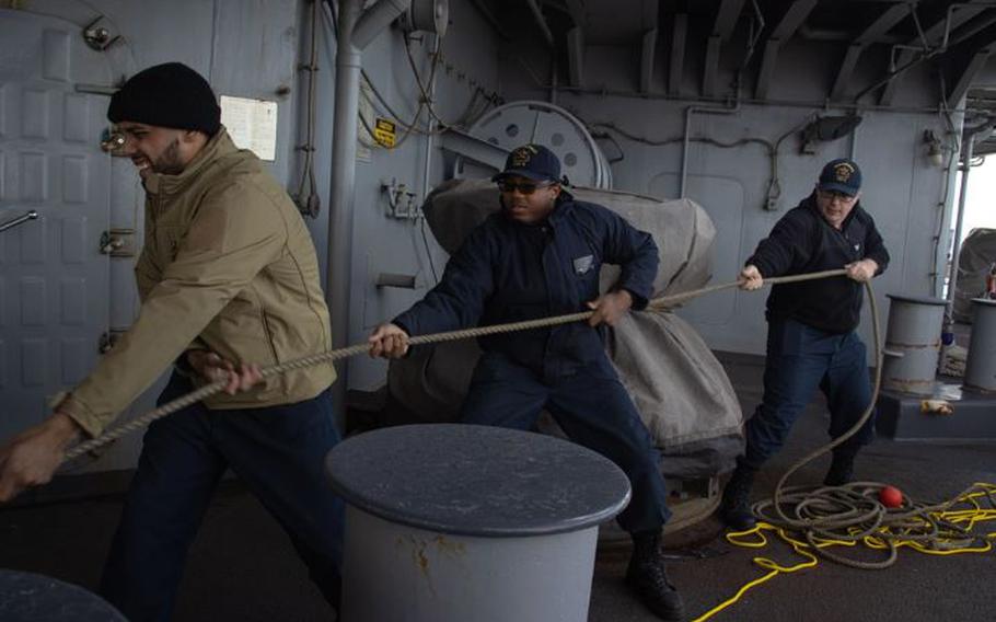 U.S. Navy Sailors with the amphibious assault ship USS America (LHA 6) moor the ship during a port visit in Osaka, Japan, Feb. 27, 2024. The port call provides U.S. Marines with the 31st Marine Expeditionary Unit and Sailors aboard the USS America opportunities to strengthen the relationship between the U.S. and Japan, and allows the crew some time for relaxation, and time to make logistic preparations for upcoming exercises. The 31st MEU is operating aboard ships of the America Amphibious Ready Group in the 7th Fleet area of operations to enhance interoperability with allies and partners and serve as a ready response force to defend peace and stability in the Indo-Pacific region.