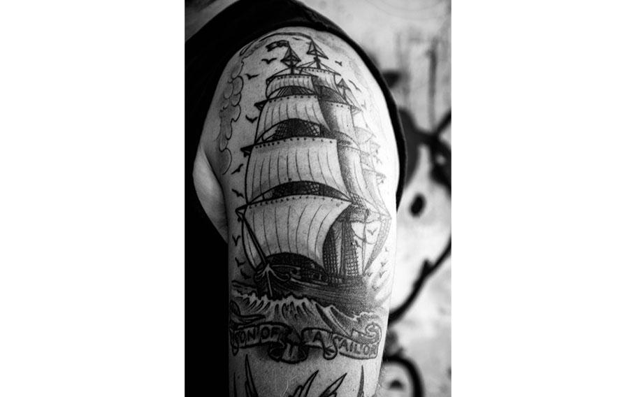 Fully rigged ship
 tattoo on one’s arm.