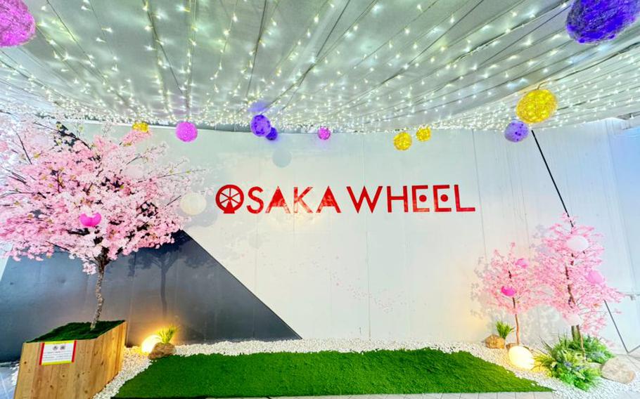 most likely the entrance of Osaka Wheel. artificial cherry trees are displayed.