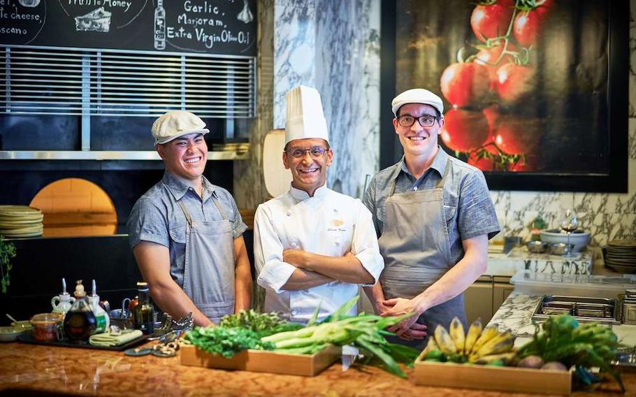 The Pizza Bar on 38th staff posing for a photo