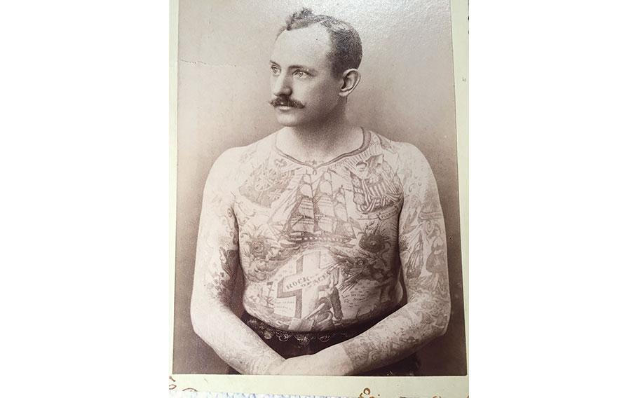 Jacob Hildebrandt displaying tattoos.