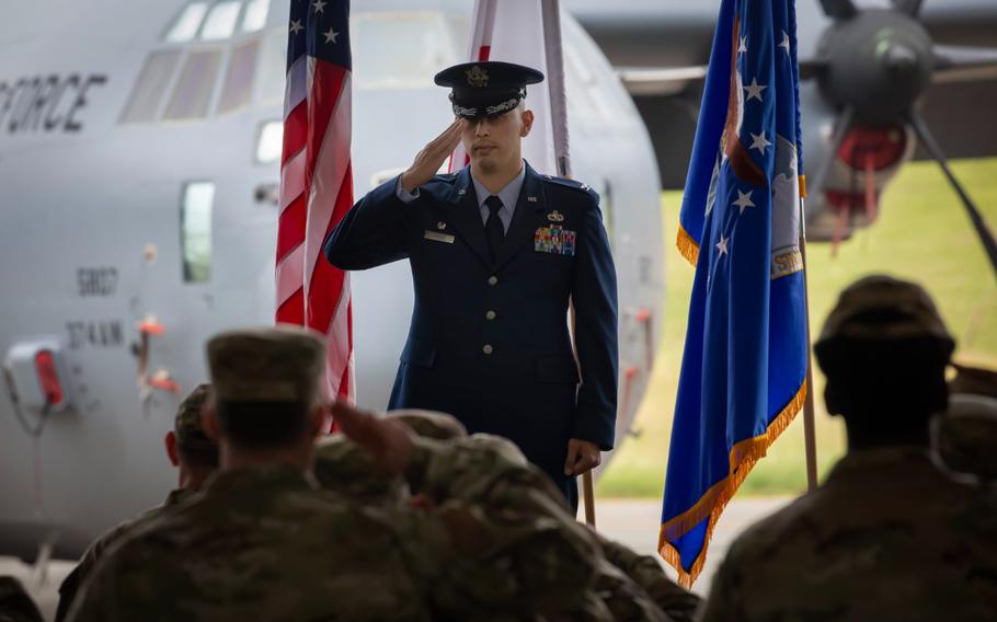 U.S. Air Force Col. Martin Perez, 374th Maintenance Group incoming commander, renders a first salute during the 374 MXG change of command ceremony at Yokota Air Base, Japan, June 13, 2025