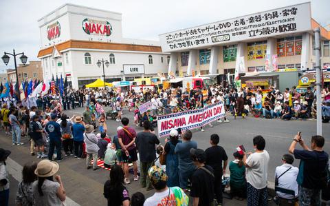 Photo Of U.S. military service and family members participate in a parade during American Day 2025 at Misawa, Japan, Jun 15, 2025.