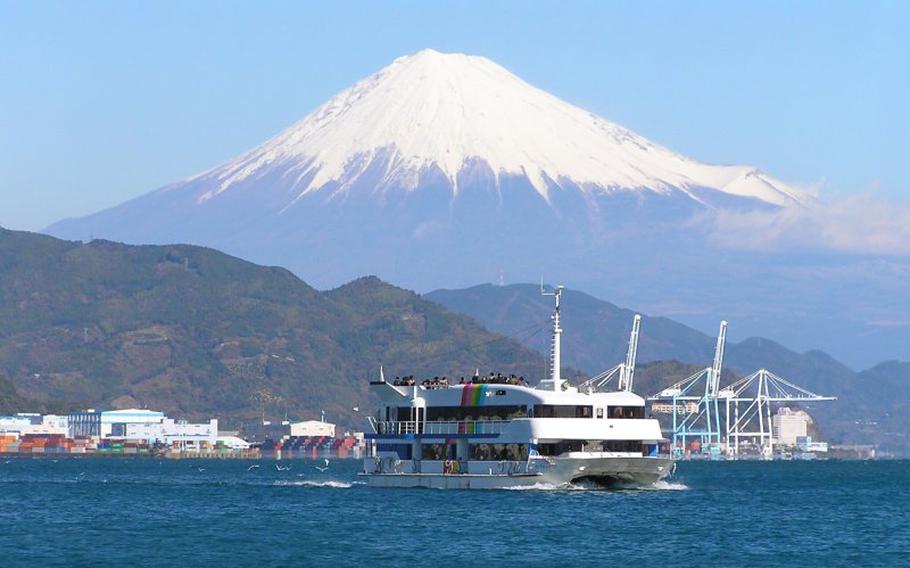 a cruise and mt. fuji can be seen.