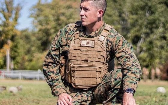 U.S. Marine Corps 1stLt James Detulleo scans his surroundings during training.