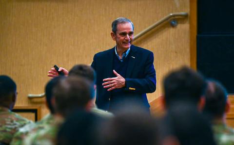 Photo Of U.S. Air Force retired Col. Lee Ellis shares his experiences and insights with gestures.